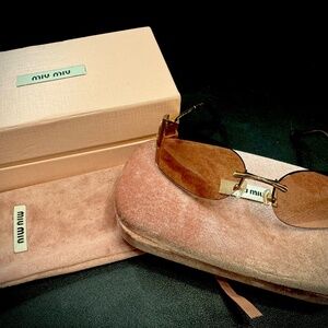 Miu Miu Women's Sunglasses SMU A51S, Light Brown Size: 75mm